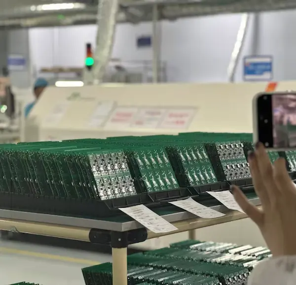 PCB assembly after SMT process showing soldered components prior to conformal coating and final functional testing in payment terminal production