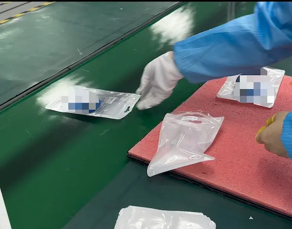 Box-build assembly line integrating injection-molded housings, custom wire harnesses, and PCBA into finished payment terminal units under ISO 9001 process control