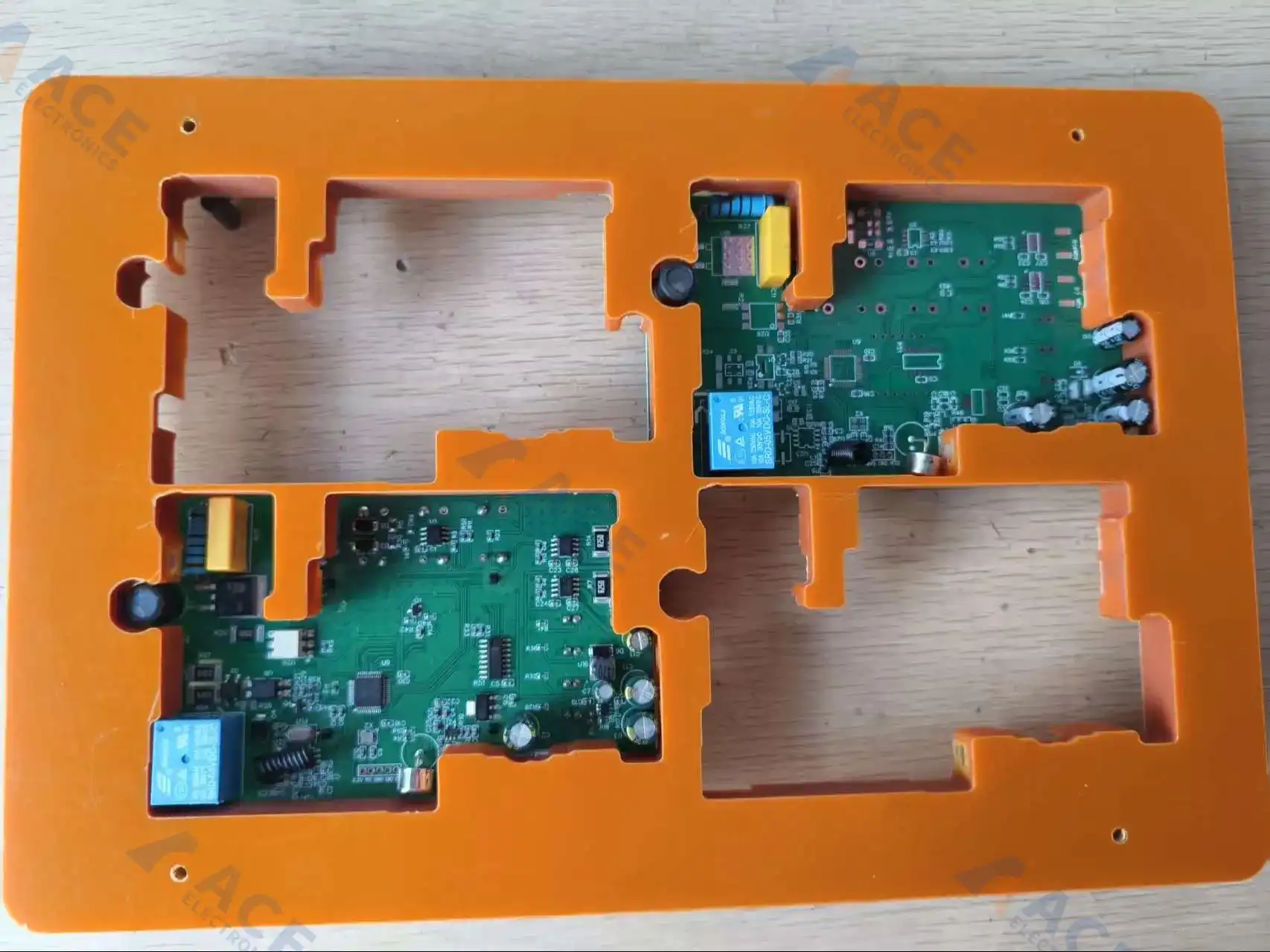 Customized coating fixture holding a PCB assembly for repeatable conformal coating masking