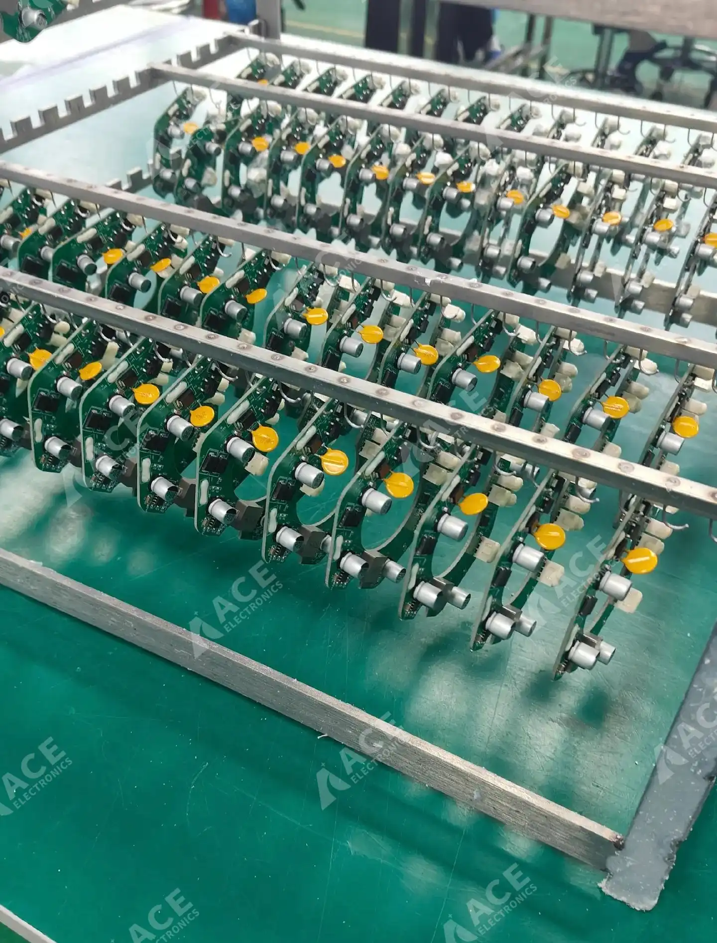 Close-up of BLDC motor PCB assemblies prepared for parylene coating