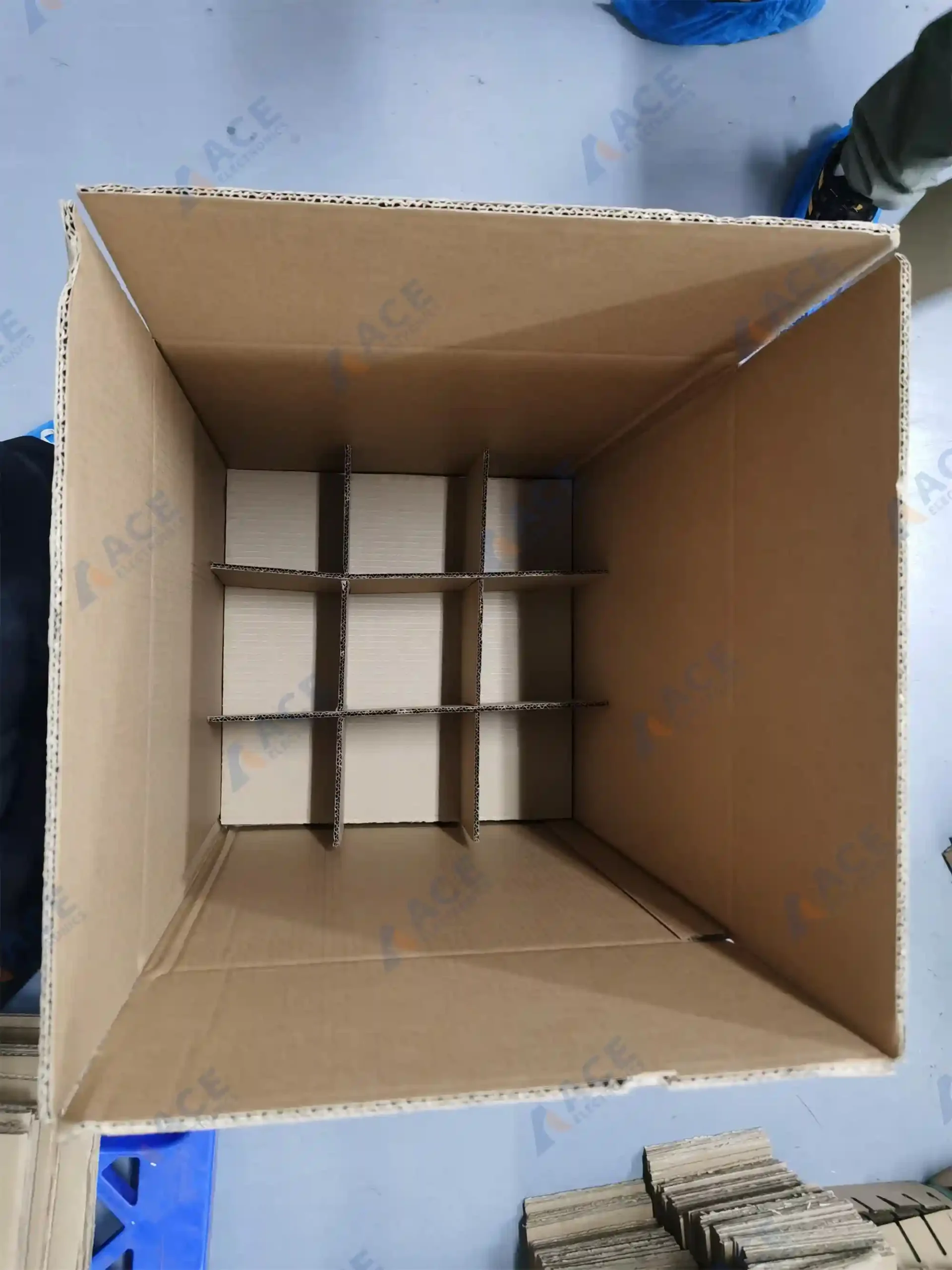 Five-ply corrugated export carton with die-cut dividers for PCBA shipment